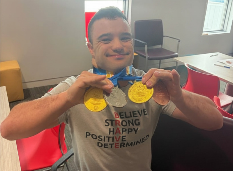Alex with his medals.