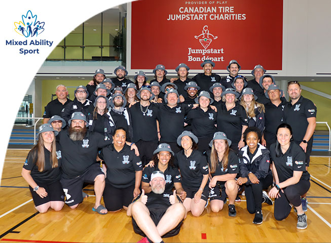 Top left corner is the Mixed Ability Sport Logo the image shows a group photo of abilities centre staff and oshawa vikings rugby in the field house