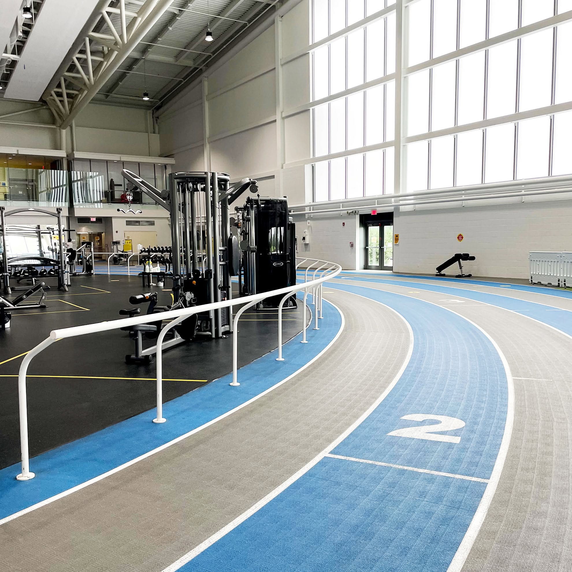 The walking track corner along with some weight machines.
