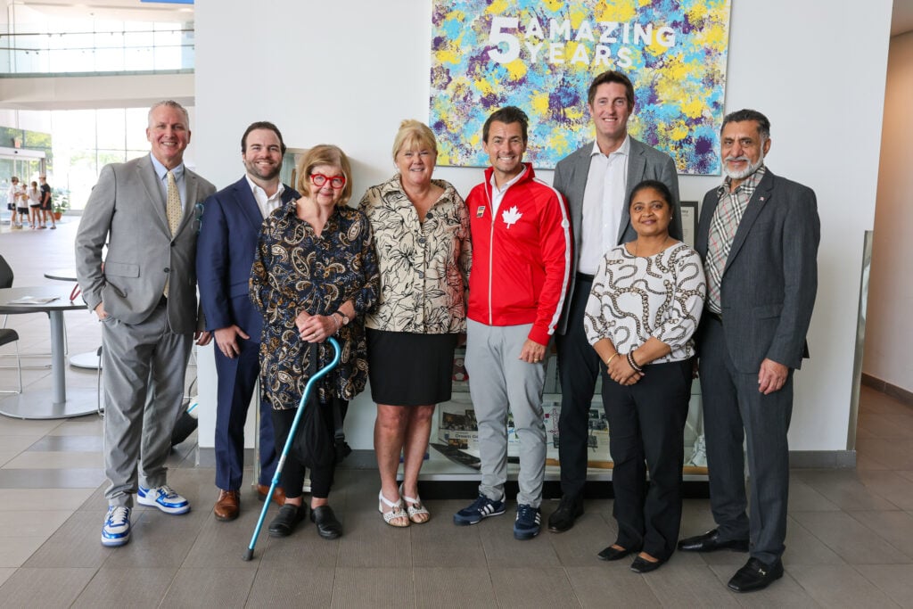 Abilities Centre Board members and CEO pose with the Honourable Adam van Koeverden along with M.P.s Ryan Turnbull and Juanita Nathan.